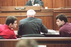 The Menendez brothers confer during their joint trial 